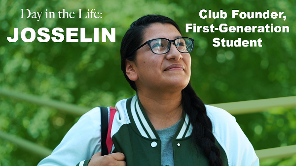 Day in the life: Josselin Club founder, first-generation student Female latin student with braided dark hair wearing black frame eyeglasses and green and white athletic jacket looking up and smiling against greenery background