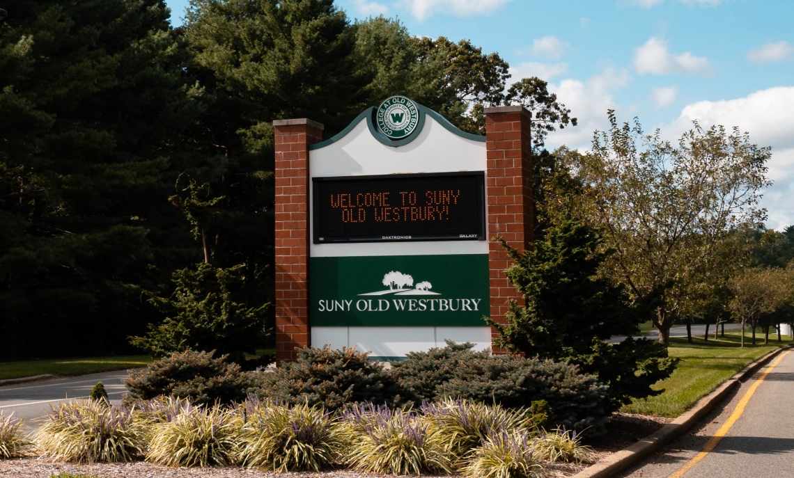 LED sign at Main College Entrance as it reads "Welcome to SUNY Old Westbury"