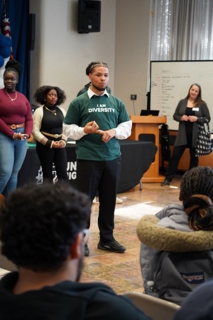 Antoine Brewster talking to Uniondale High School Students