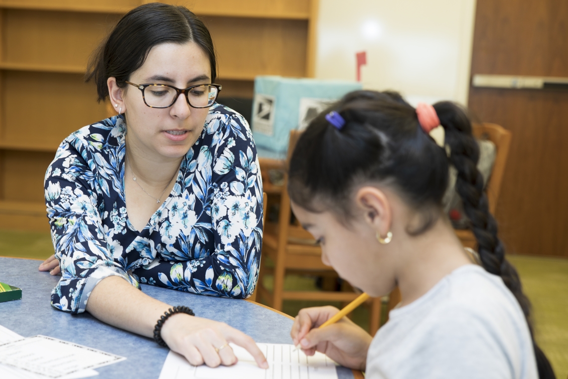 graduate student with literacy clinic student