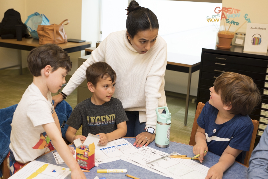 graduate student with literacy clinic students