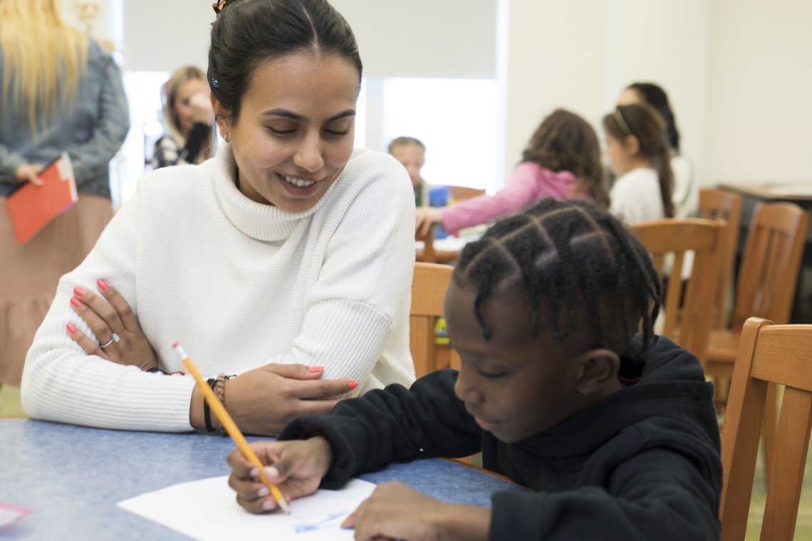 graduate student with literacy clinic student