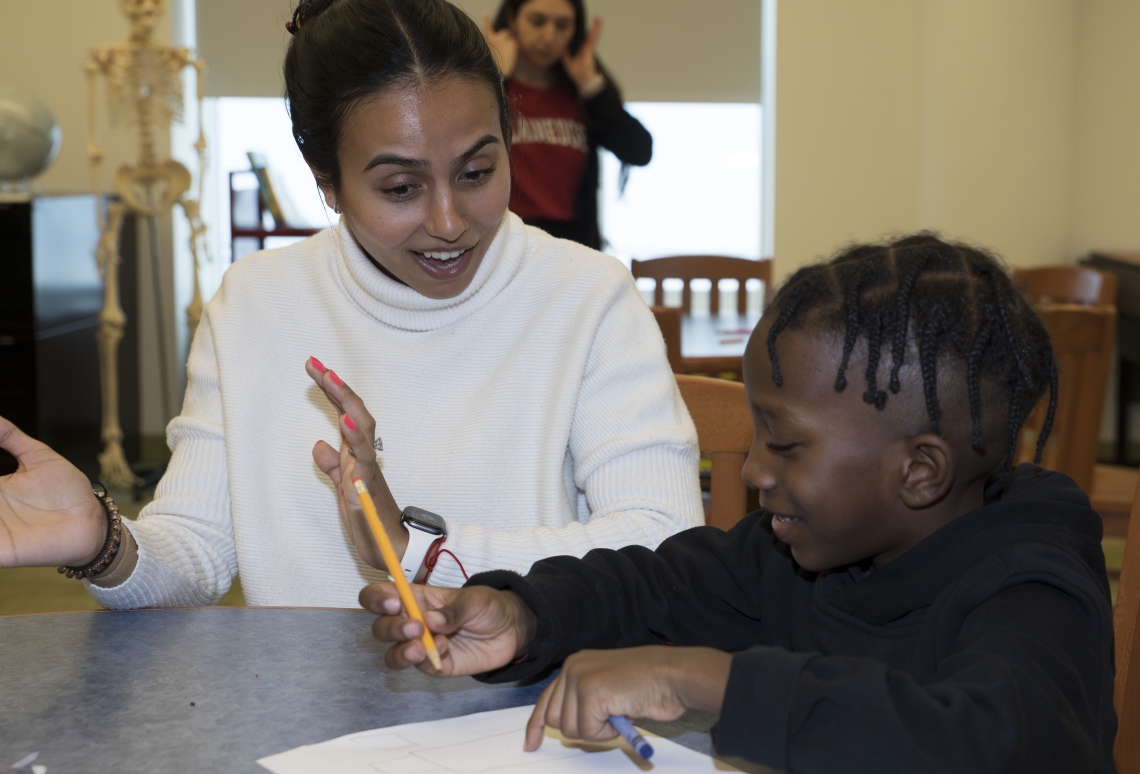 graduate student with literacy clinic student