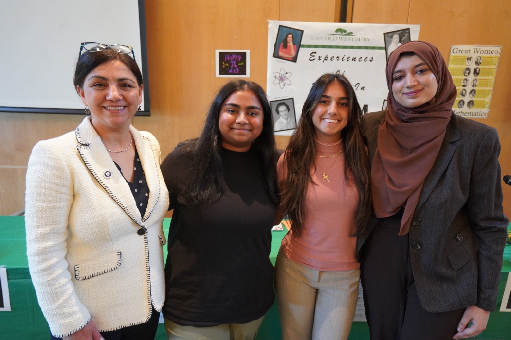 Photo of from left to right SUNY Vice Chancellor Dr.  Fatemeh (Shadi) Shahedipour-Sandvik, Old Westbury students Melia A. Mirdha, Dominique Crecco and Fatima Bhali.
