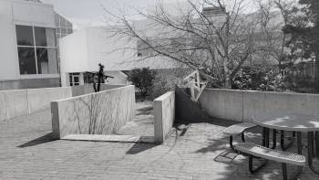 brick patio with metal sculptures in place