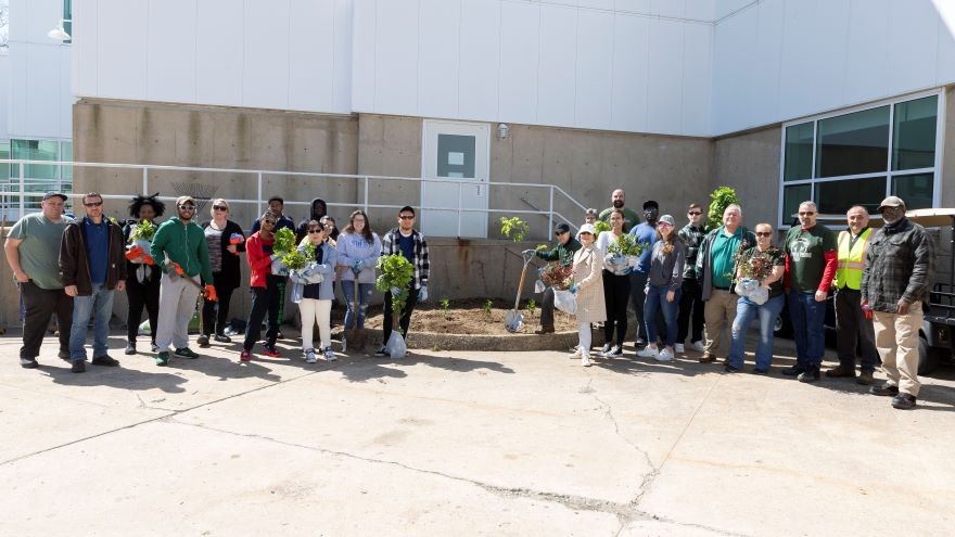 23 people pose for a group photo