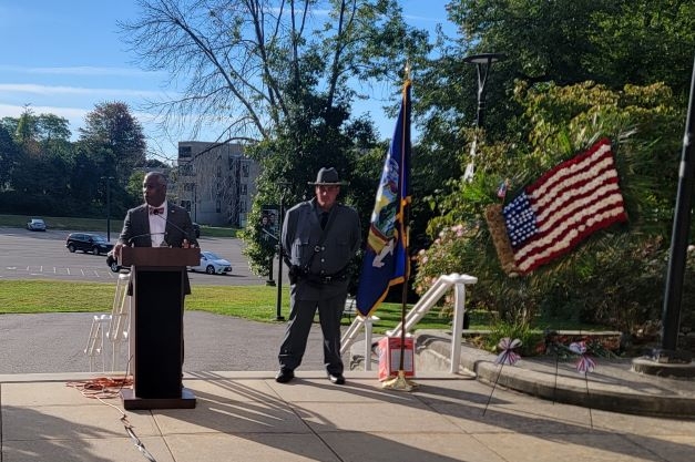 President Sams and a UPD Officer at the memorial
