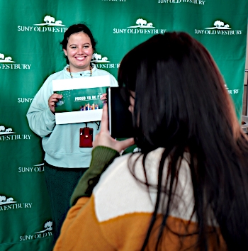 Student having her photo taken during First Generation Celebration Day
