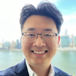 Asian American man with glasses