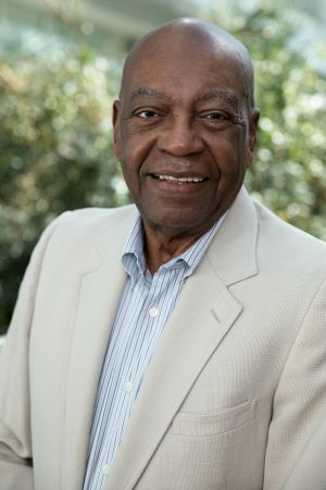 African American man in tan sportcoat