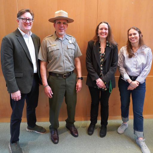 Two men and two women pose for a group photo