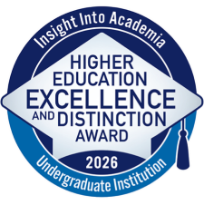 Blue and white badge with text reading Higher Education Excellence and Distinction Award 2026
