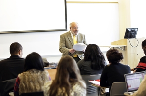 Professor Karl Grossman teaches class