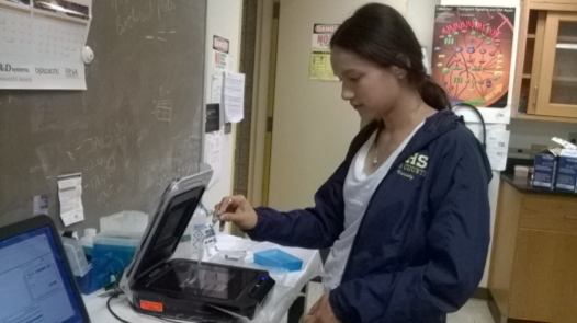 A female student in a science lab