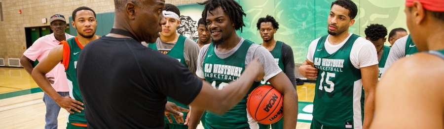 Coach Tomlin during a men's basketball practice