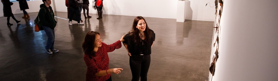 Patrons enjoying a Wallace Gallery exhibit