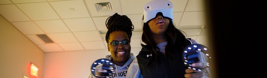 Two students in virtual reality lab
