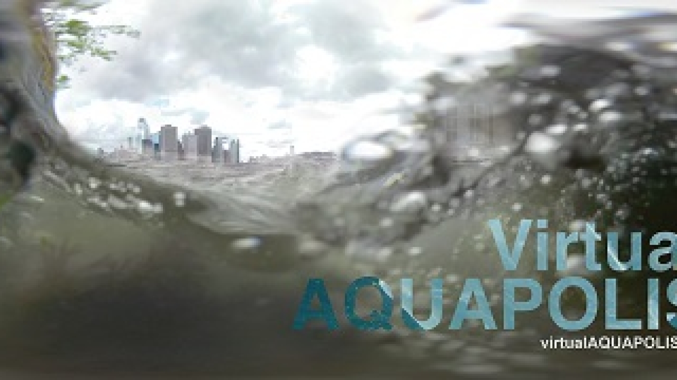 View from a camera with water sloshing over it with the text Virtual Aquapolis appearing