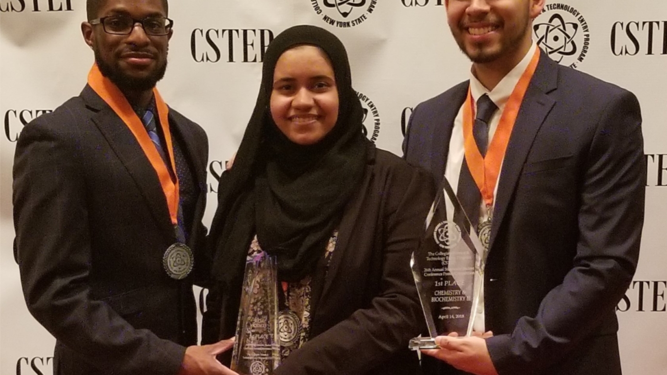 CSTEP student researchers with award
