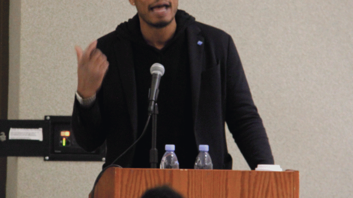 Hayes speaks from podium