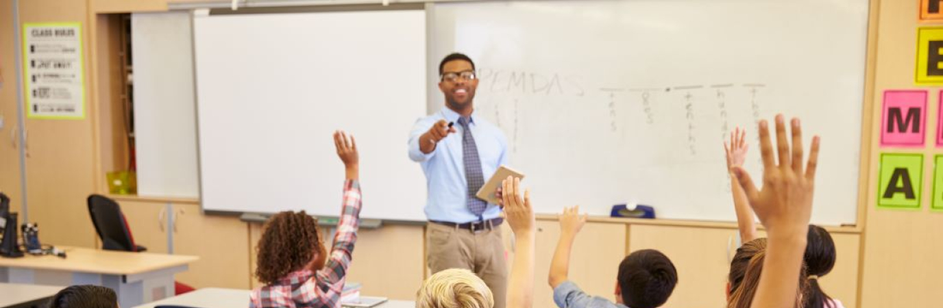 Teacher in front of a classroom