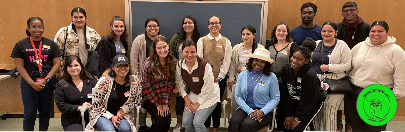 18 TOC students standing in a group after a seminar