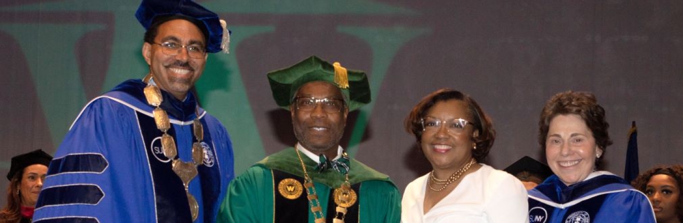 President Sams (second from left) with, from left, Chancellor John King, Frenita Sams, Merryl Tisch