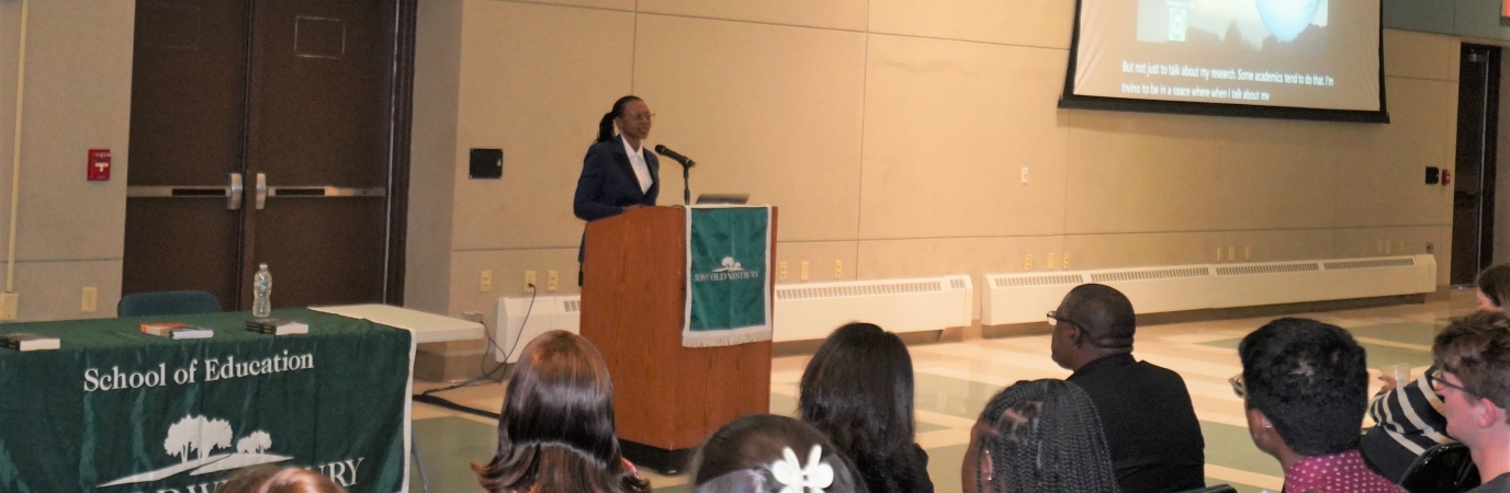 Guest speaker at a lectern in the Student Union Multipurpose Room