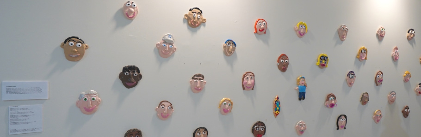 Photo of Paper-Mache self portraits at the ACLD Art Exhibition at SUNY Old Westbury