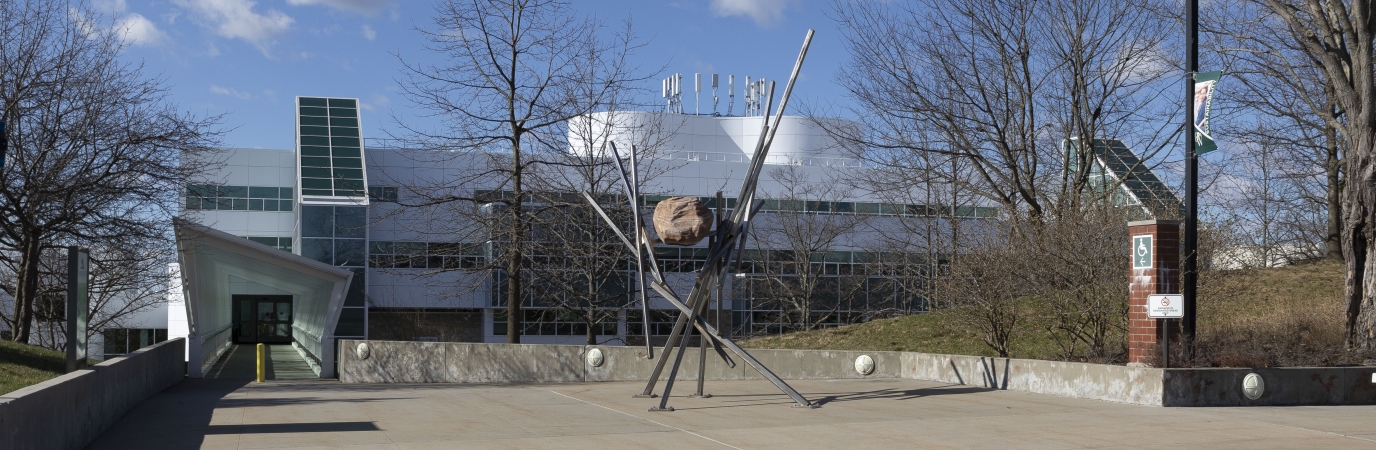 Stone and steel sculpture on the plaza outside campus center