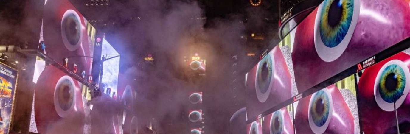 Photo of Professor Tricia McLaughlin's most recent 3D animation work, Life Forms playing at Times Square 