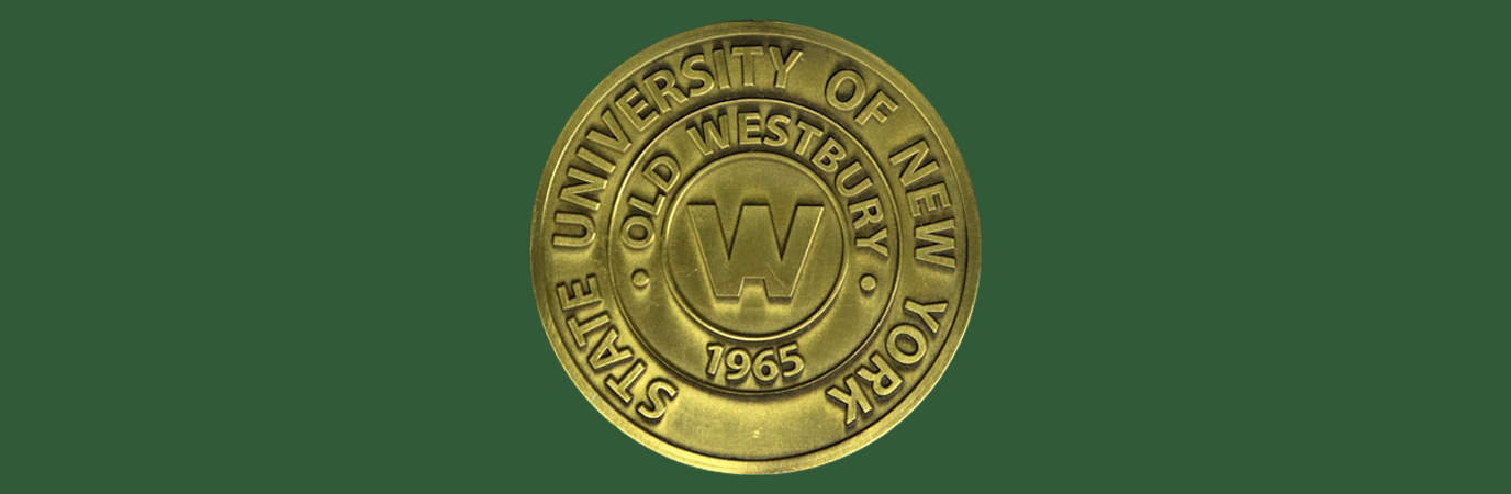 Round, gold medal on a green background inscribed "SUNY Old Westbury"
