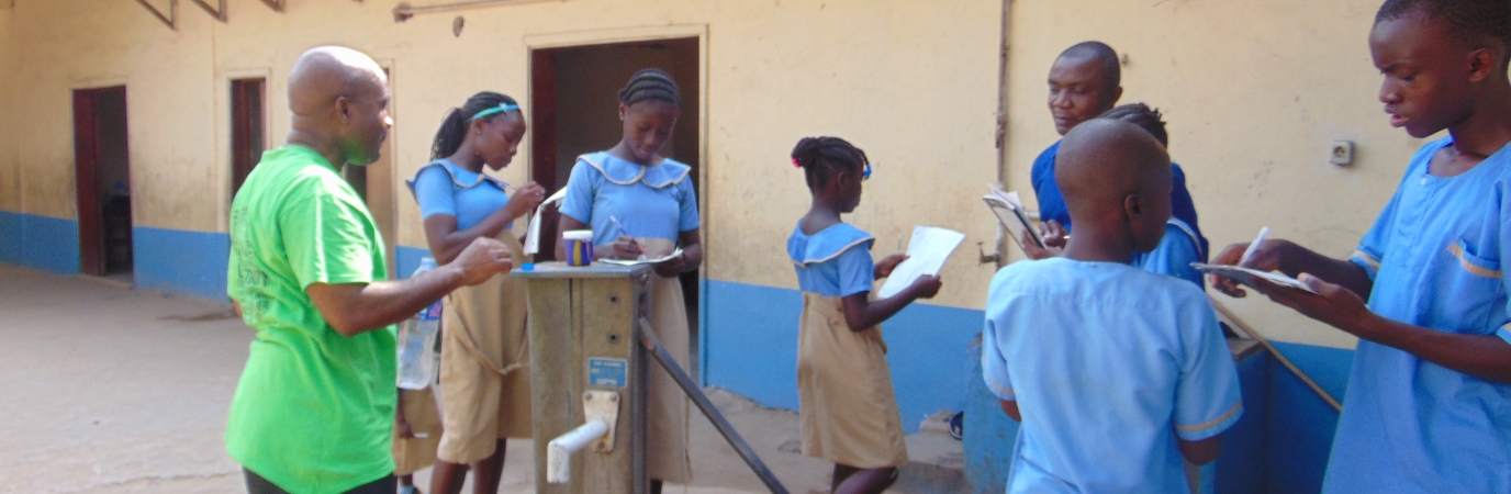 Stemn with students in Liberia