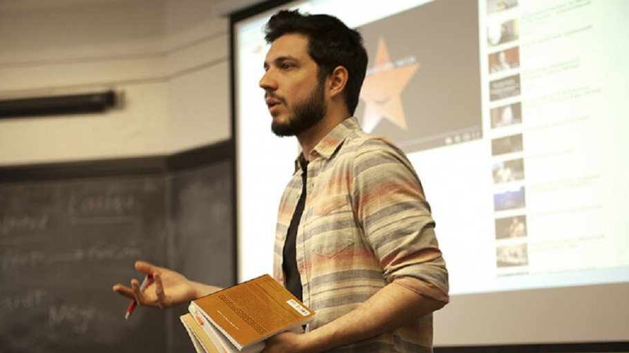 Santiago Acosta lectures before a class