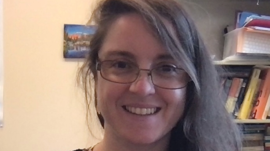 Headshot of Jennie D'Ambroise in a black shirt