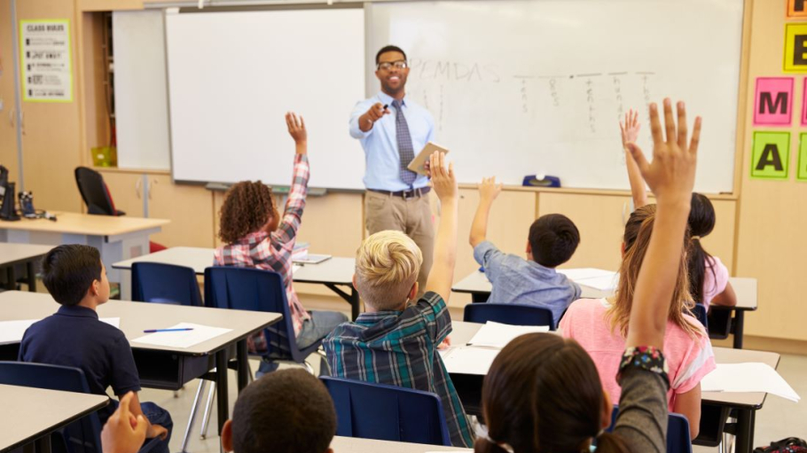 Teacher in front of a classroom