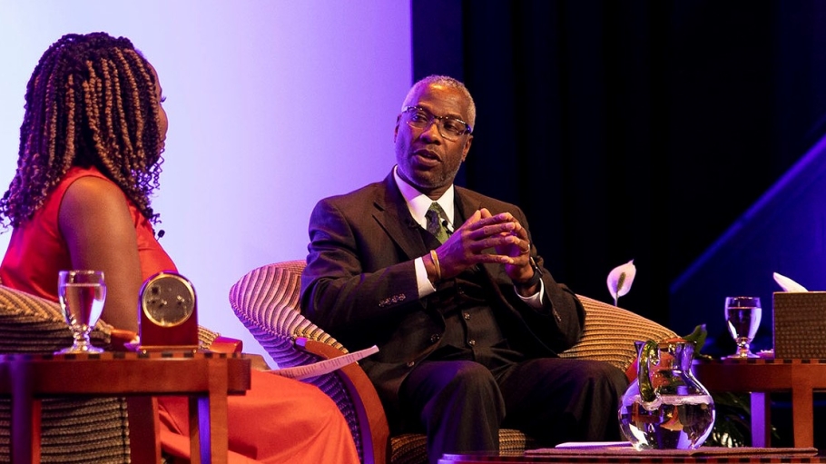 President Sams on stage in the Maguire Theater being interviewed by CNN's Eva McKend