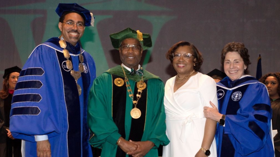 President Sams (second from left) with, from left, Chancellor John King, Frenita Sams, Merryl Tisch