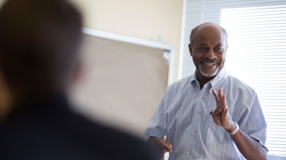 Robert Hoyte lecturing in a classroom