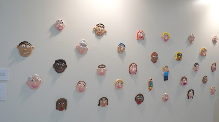 Photo of Paper-Mache self portraits at the ACLD Art Exhibition at SUNY Old Westbury