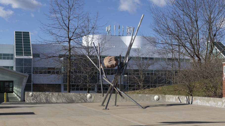 Stone and steel sculpture on the plaza outside campus center