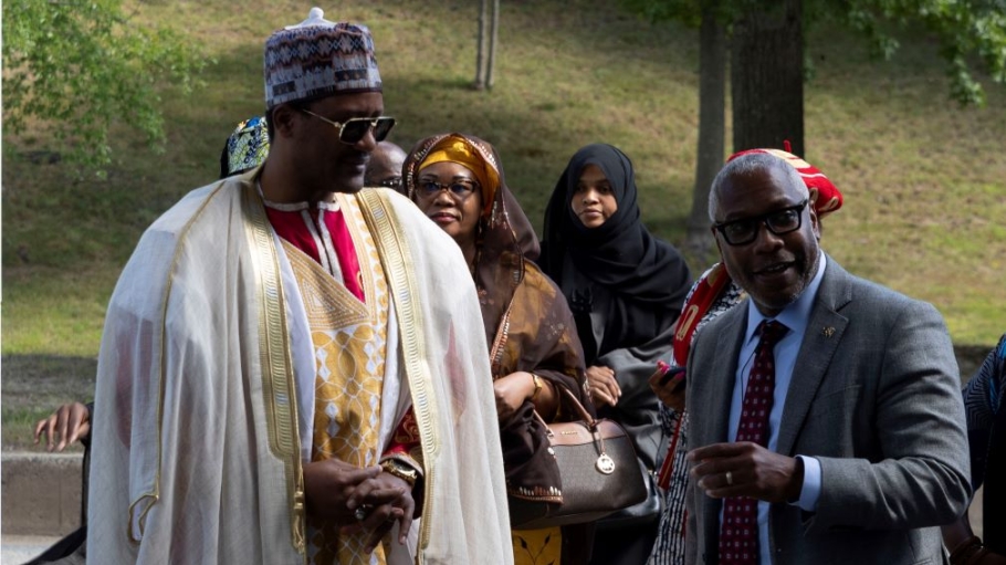 King and president greet each other