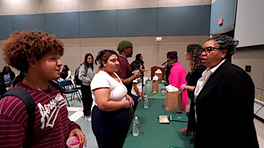 Photo of Students talking to First Generation Panel members