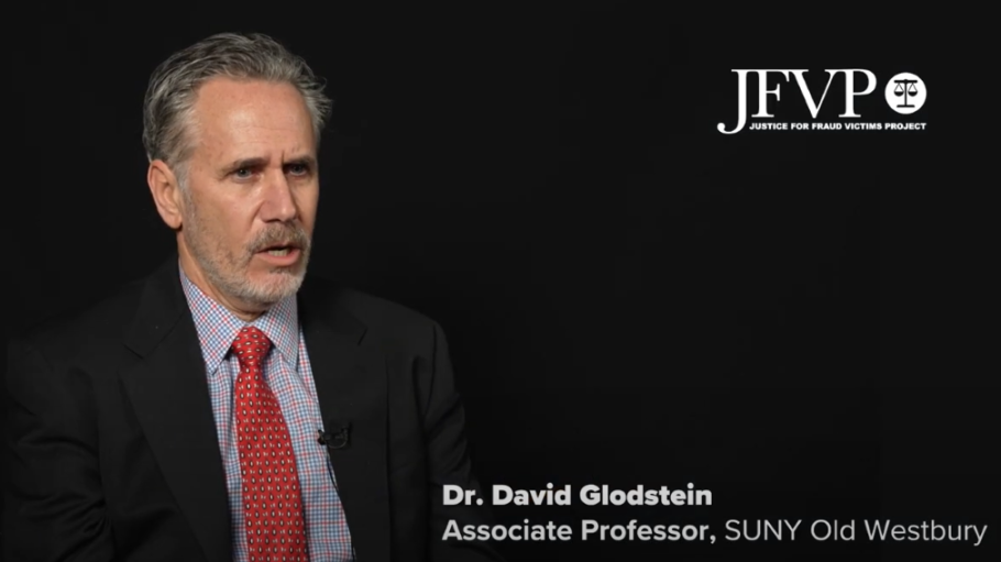White man in suit and tie with text reading "JFVP: Justice for Fraud Victims Project" and "Dr. David Glodstein, associate professor"