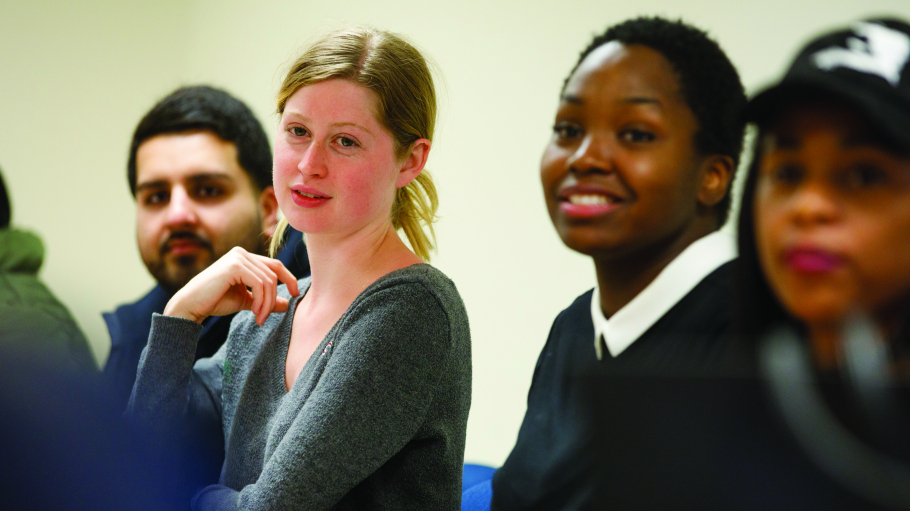 Four students in a classroom
