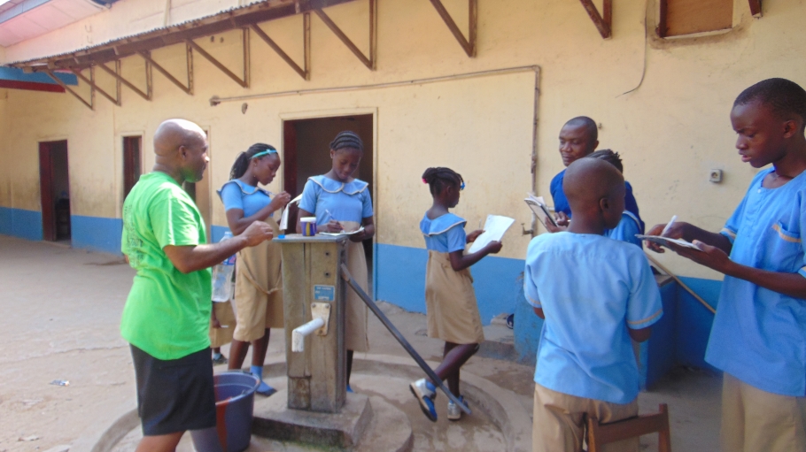 Stemn with students in Liberia