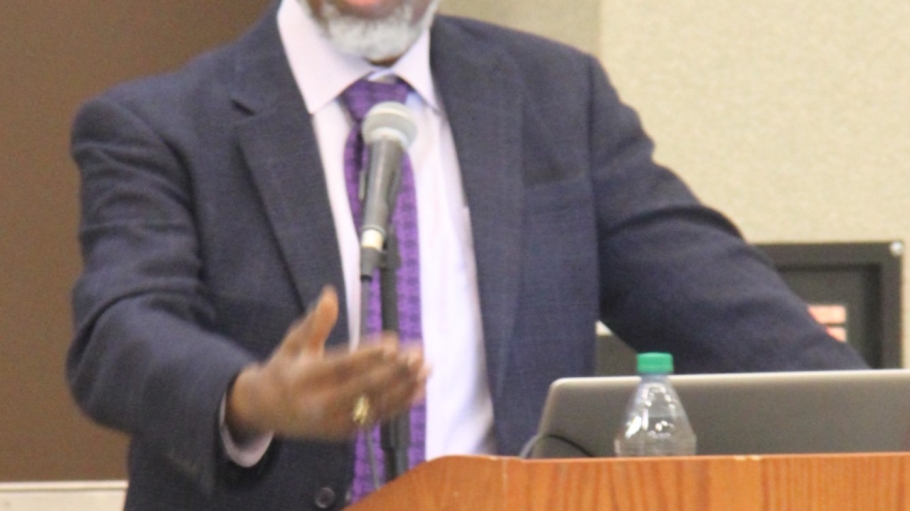 Sylvester Gates addresses the audience