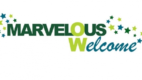 "Marvelous Welcome" in blue and greent text with stars around it