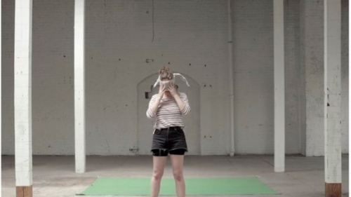 Blindfolded woman on roller skates