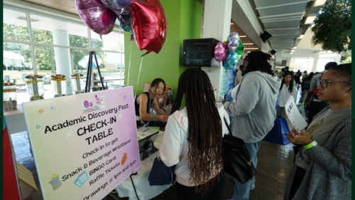 Photo of students at a table during the second annual Academic Discovery Fest